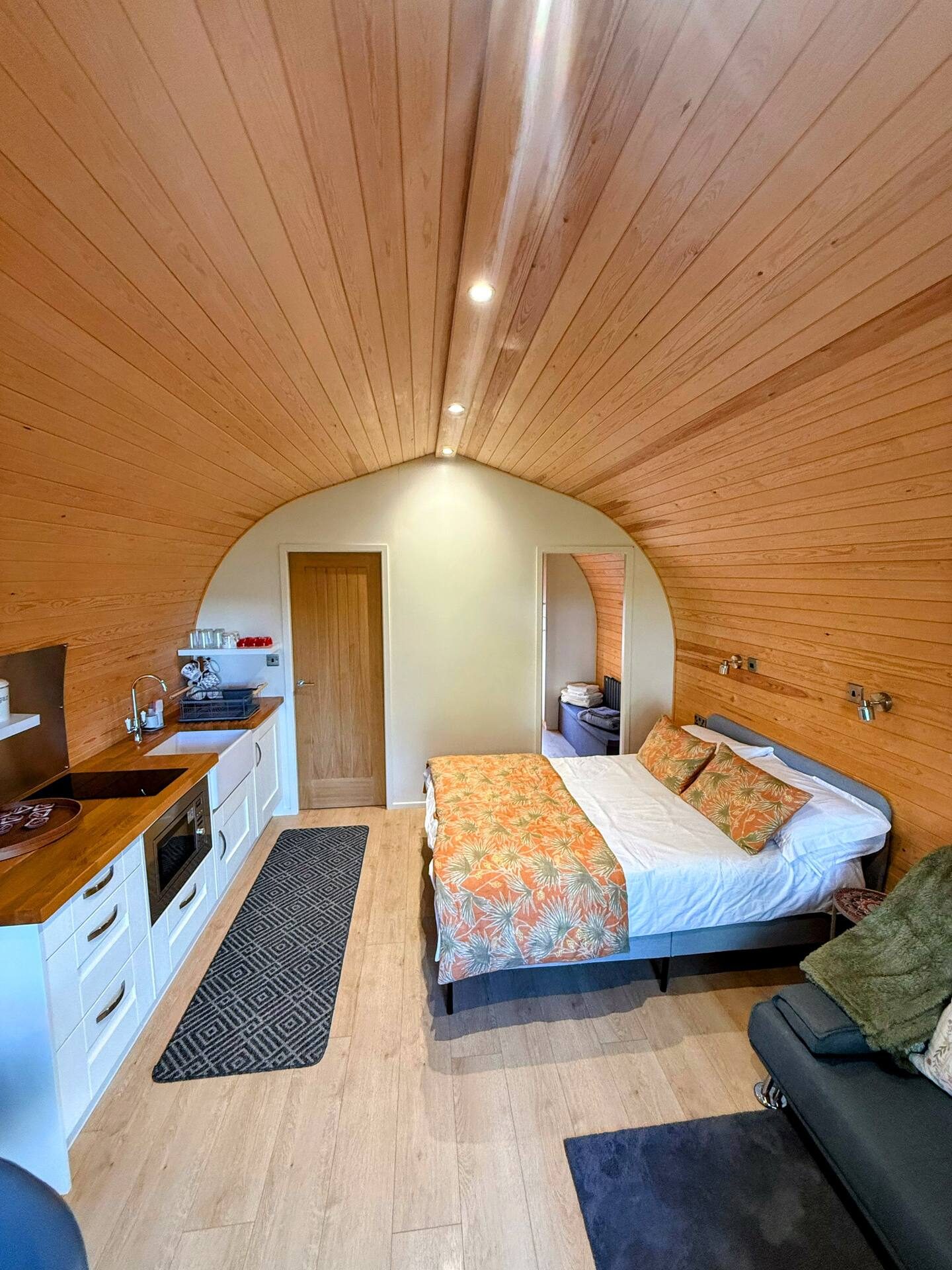 Cosy double bedroom inside the glamping pod